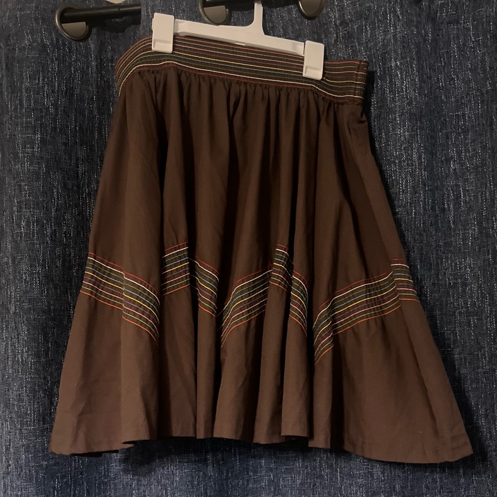 Brown skirt with rainbow striped stitching